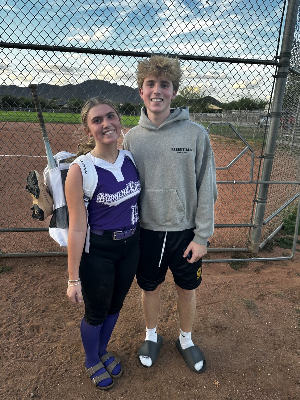 Jax with his sister Kendrix at her softball game
